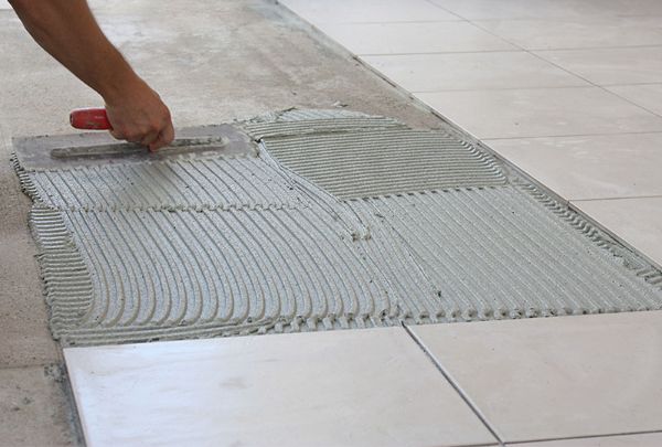 How to Lay Floor Tiles on Concrete